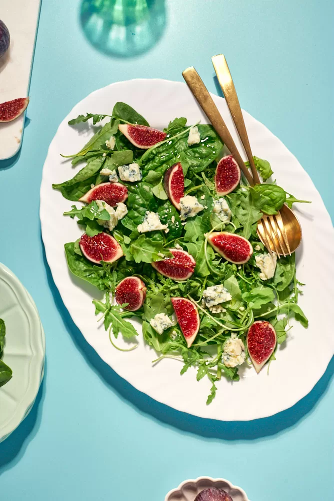Fresh, bright and colorful food photography of fig and bleu cheese salad