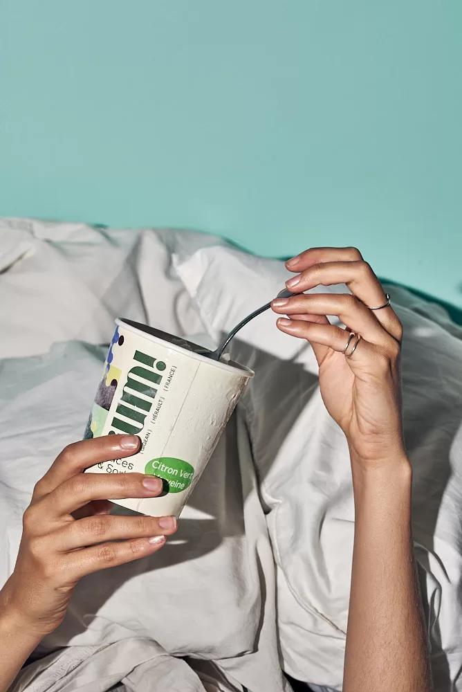 Product photography for French Ice cream brand in Barcelona. hands in bed eating ice cream